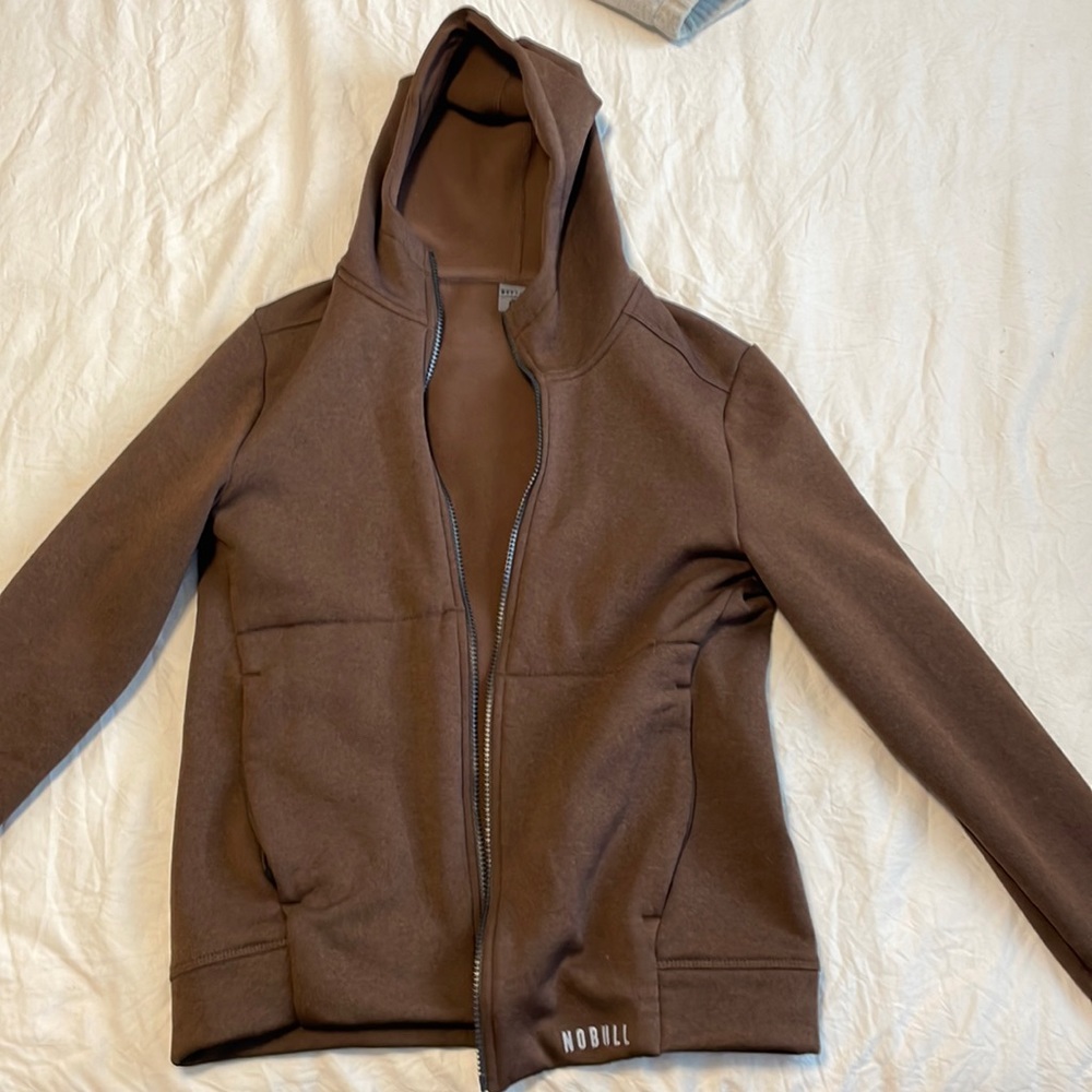 No bull womens performs zip hoodie. Color is brown. Brand new only worn once.